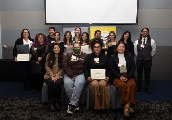 Group of scholarship recipients posing for group photo.